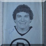 C03. Autographed Bruins photo. 
